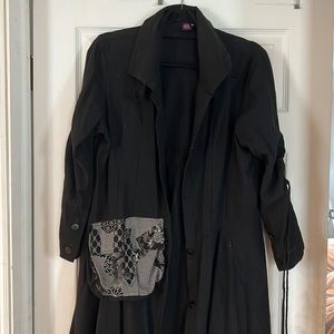 Medium one of a kind light jacket with attached bag